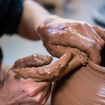 Doug Fitch and Hannah McAndrew making a jug for me